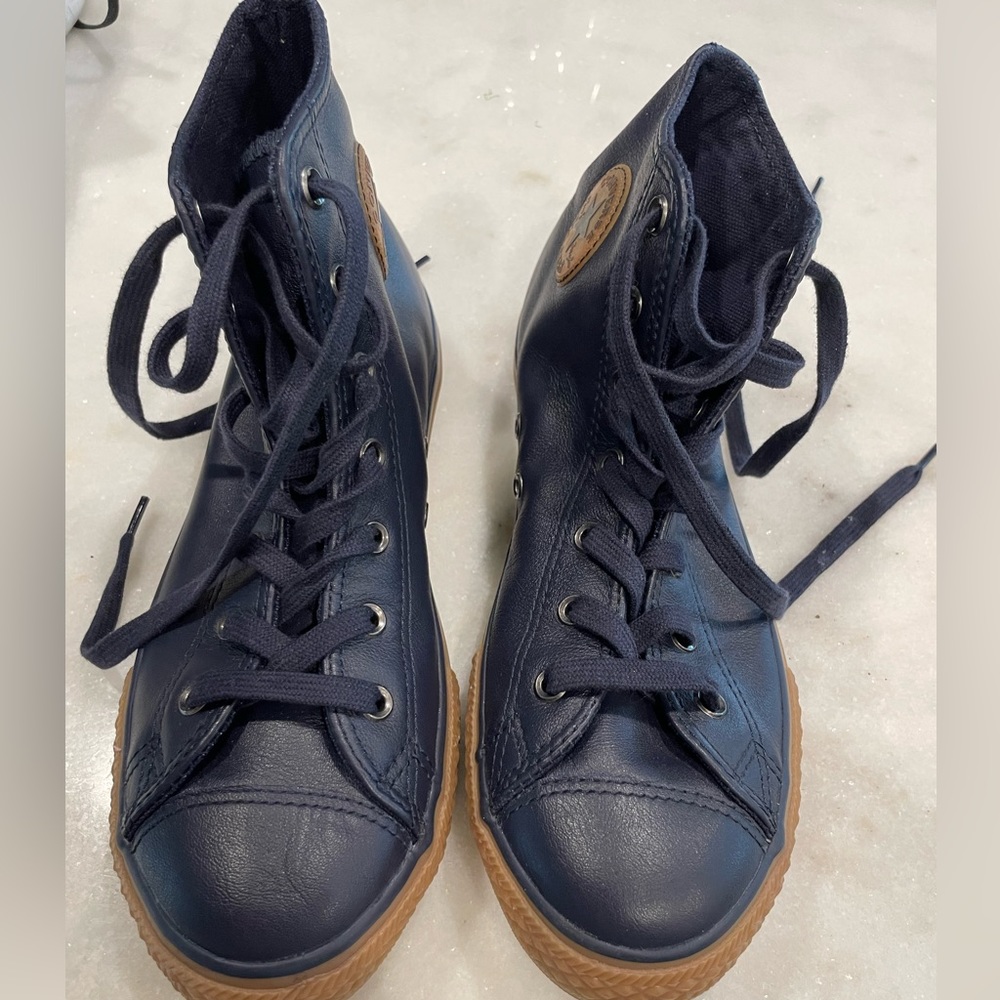 Converse All Star Chuck Taylor leather youth size 5.5 compare to women’s size 7.
